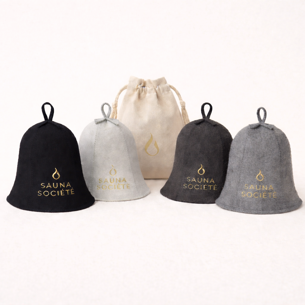Sauna Societe luxury sauna hats in white, black, light gray and charchoal with a drawstring storage bag.